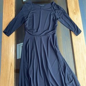 Flattering long black dress with slightly ruffled waist